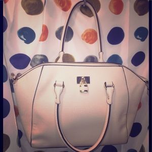 Cream colored bag by Call It Spring